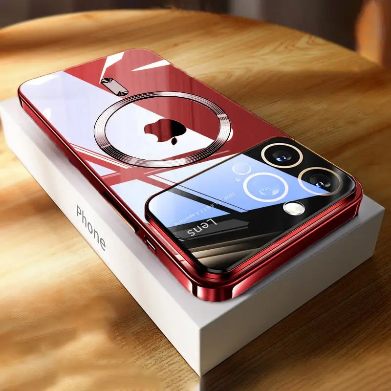a red and white iphone case sitting on top of a wooden table