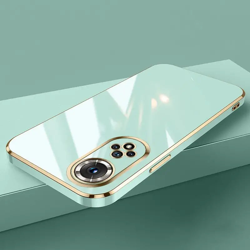 a gold iphone case with a camera on top