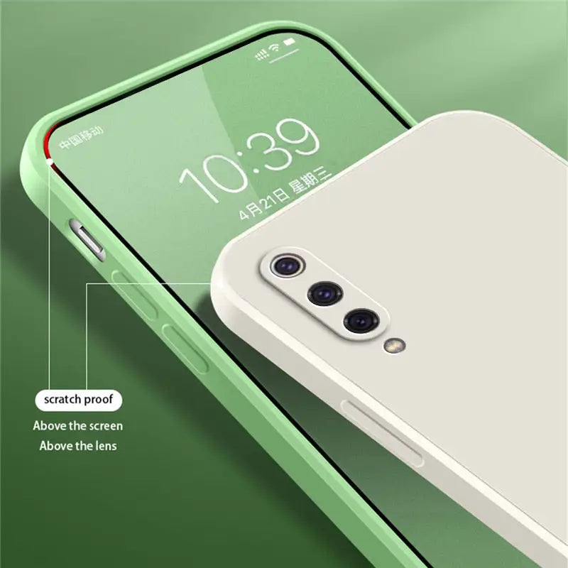 The back of a white iphone with a green background