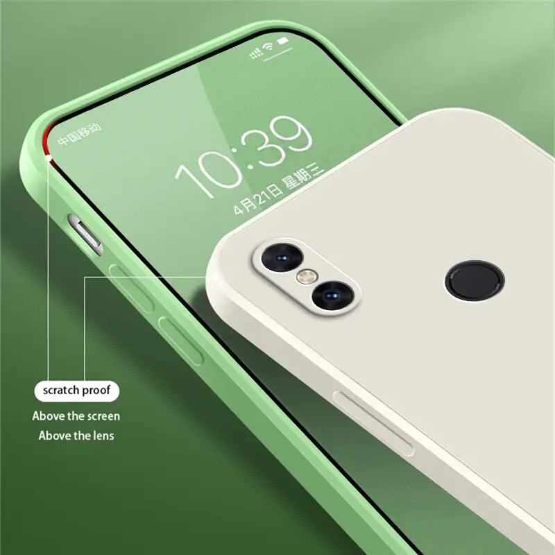 the back of a white iphone with a green background