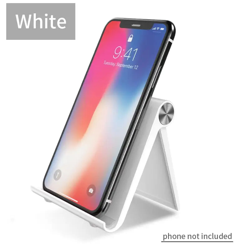 the white iphone x stand with a phone in it