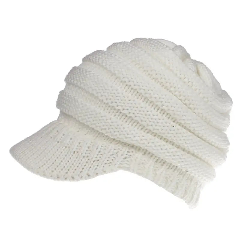 a white knit hat with a cable