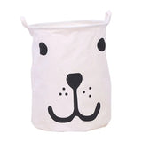a white laundry bag with a black and white bear face