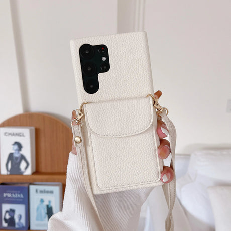 White leather phone case with a crossbody strap and front pocket.