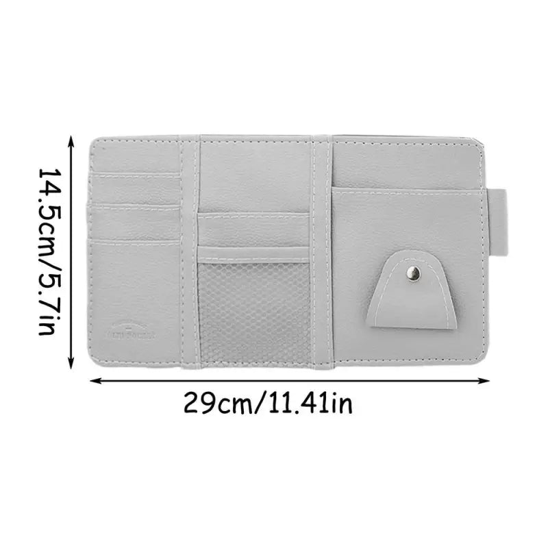 a white leather wallet with a small pocket