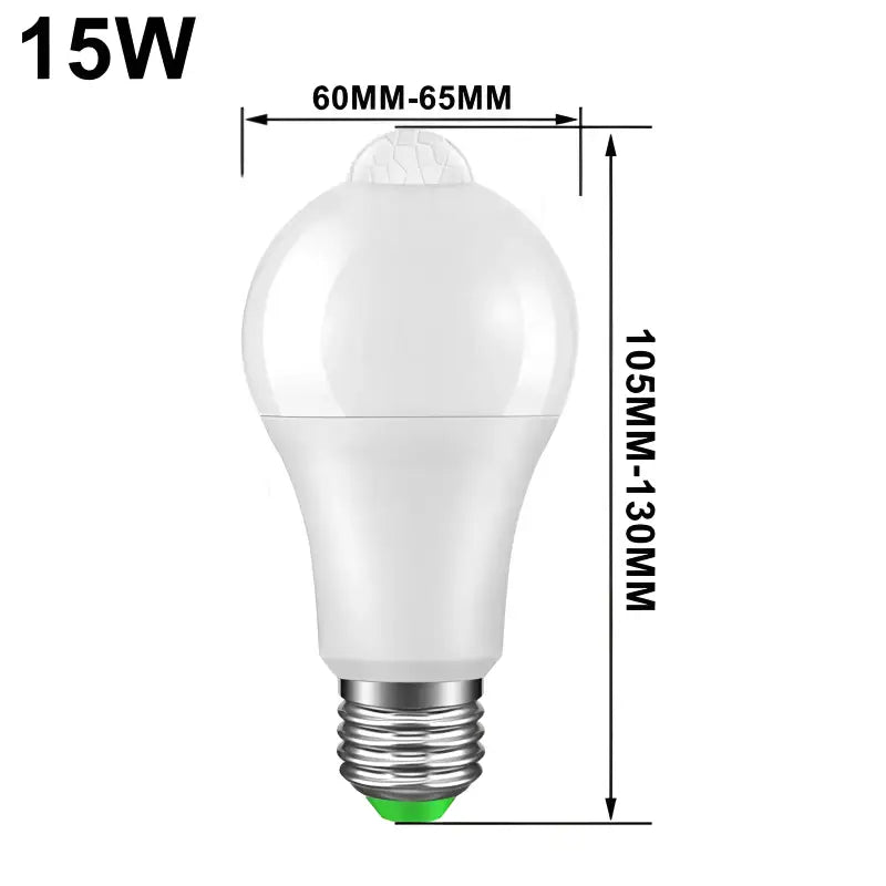 a white light bulb with a green light on top of it