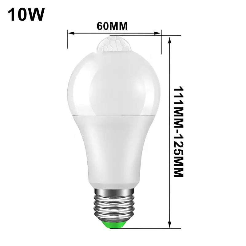 a white light bulb with a green light on top of it