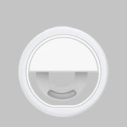 a white light on a gray background