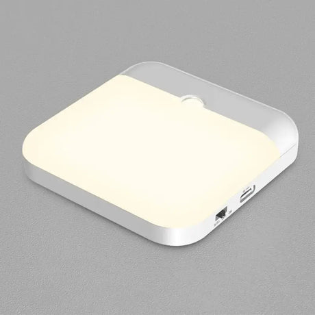 A white light on a gray surface