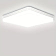 a white ceiling light with a square shape