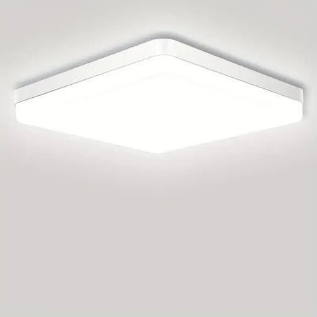 a white ceiling light with a square shape