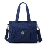 a blue handbag with a zipper closure