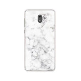 the back of a white marble phone case