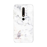the back of a white marble phone case with a black and white marble design