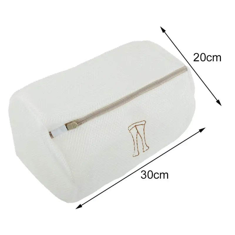 the white cosmetic bag with gold hardware