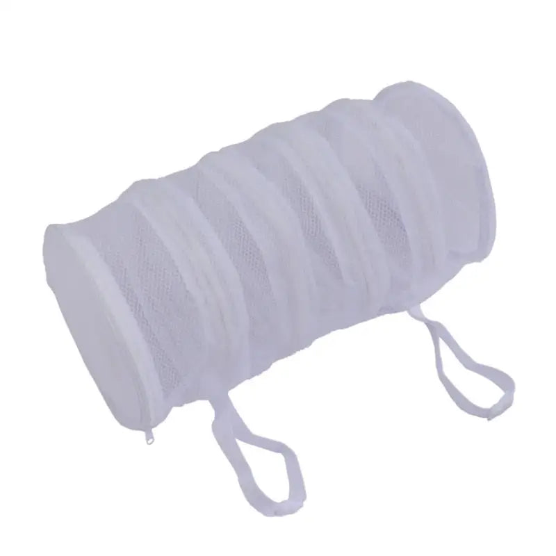 a white mesh bag with a white handle
