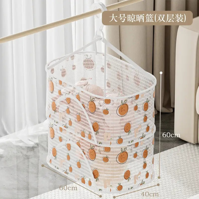 a white and orange basket with oranges on it
