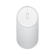 A white mouse with a white button