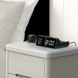 a white nightstand with a clock on top