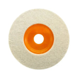 a white and orange polish pad with a hole