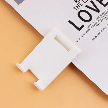 a white paper with the words love on it