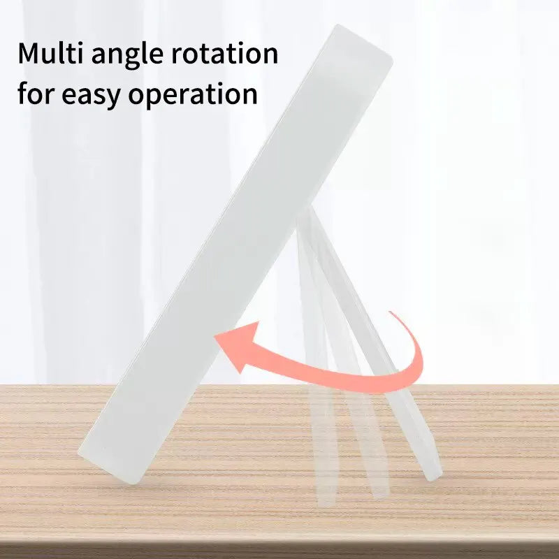 a white paper holder with a red arrow pointing up the side
