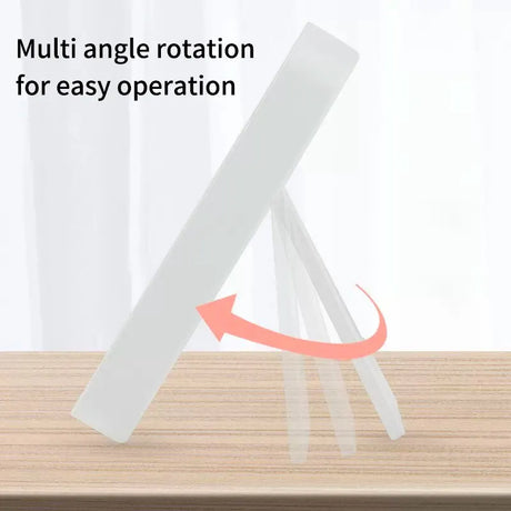 a white paper holder with a red arrow pointing up the side