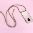 a white cell phone with a brown cord