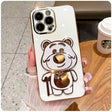 A white phone case with a brown bear on it