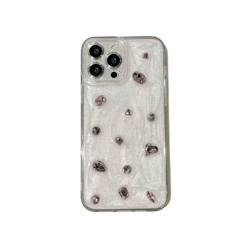 the back of a clear case with a white background and a small amount of black dots