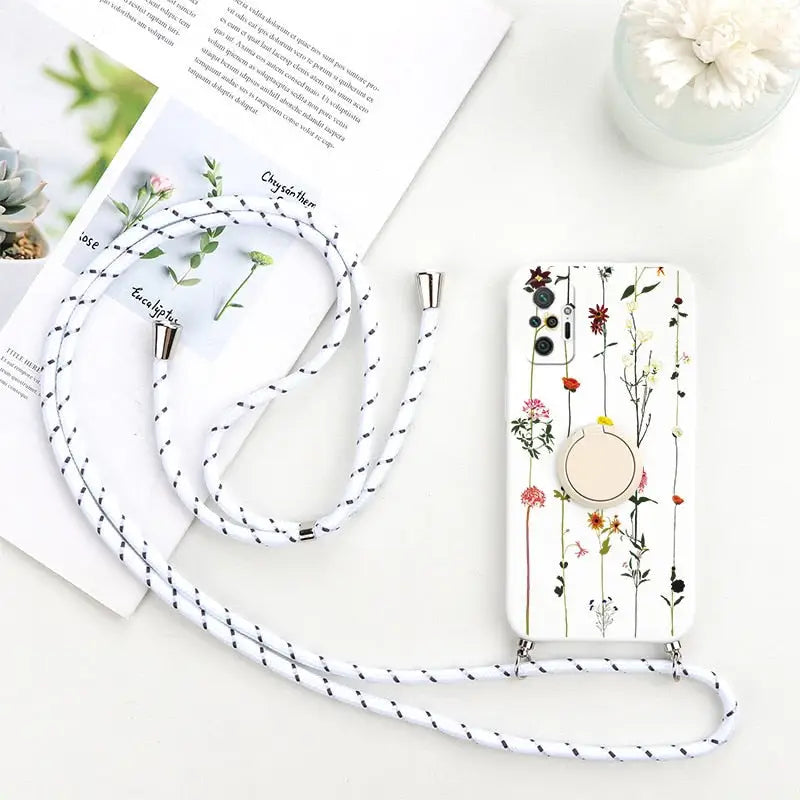 a white phone case with a floral design