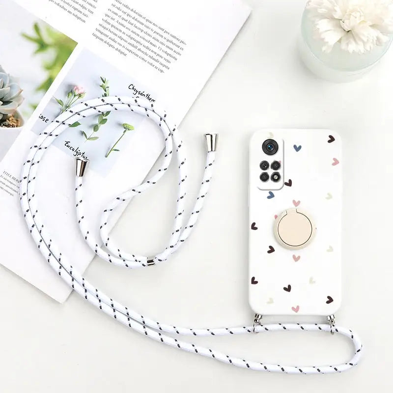 a white phone case with a black and white heart pattern