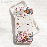 a white phone case with flowers and butterflies