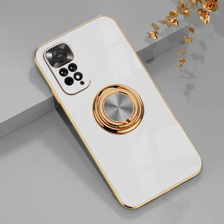 a white phone with a gold ring on it