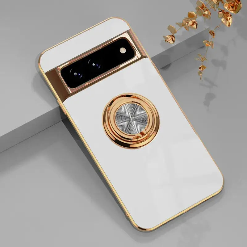 a white phone case with a gold ring