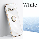 a white phone with a gold ring on it