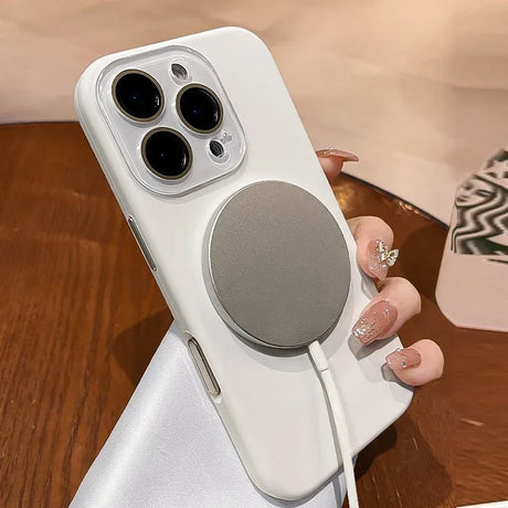 White phone case with magnetic charger.