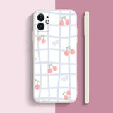 a white phone case with a cherry pattern on it