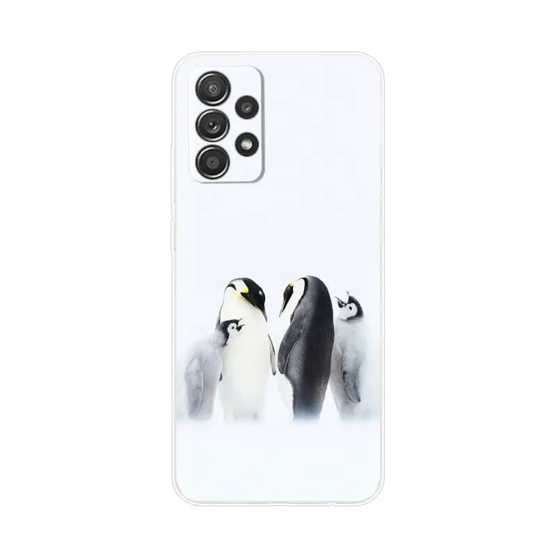 a white phone case with a penguin and penguin penguins