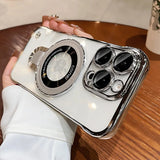 White phone case with silver accents and ring stand.