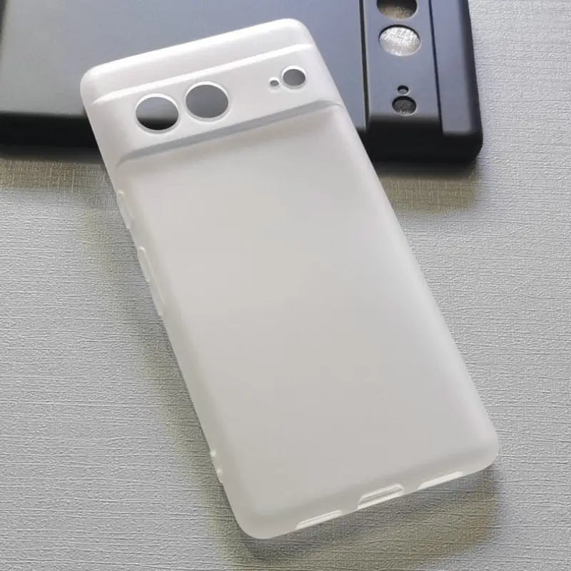 a white phone case sitting on top of a table