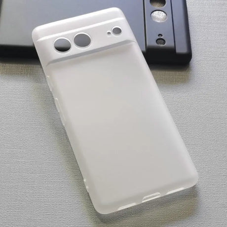 a white phone case sitting on top of a table