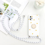 a white phone case with a yellow flower on it