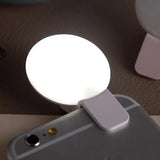 a white light on top of a phone