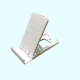 a white phone stand on a blue background