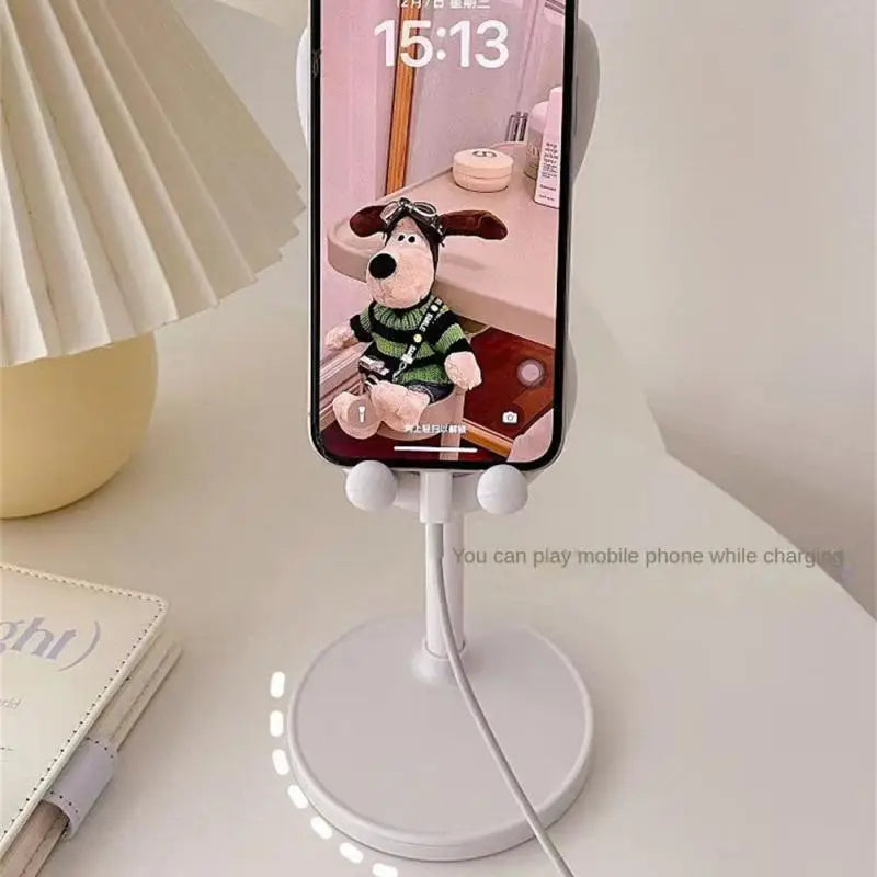a phone stand with a phone on it