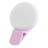 a pink and white ball on a white background