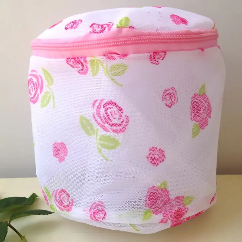 a white bag with pink roses on it