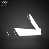 a white plastic box with a black background