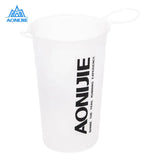 a white plastic cup with a handle and a black logo on the side